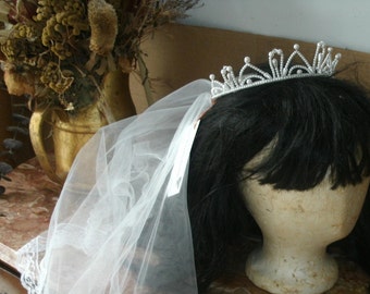 white childs veil with crown