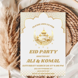 May include: White invitation card with gold accents. The card features a crescent moon with a mosque inside, and the text "Please join us for Eid Party hosted by Ali & Komal Saturday March 20 at 4:00 PM 123 Anywhere St Any City St RSVP at 000 0000 000".