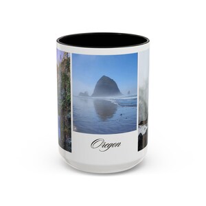 May include: White ceramic mug with a black rim. The mug features a collage of three images of Oregon landscapes. The top image shows a rocky island in the ocean with a misty background. The middle image shows a beach with a rocky island in the distance. The bottom image shows a forest scene. The text "Oregon" is printed in black cursive on the bottom of the mug.