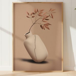 May include: A framed art print featuring a beige vase with a crack, holding a branch with reddish-brown leaves. The artwork has a minimalist style, with a neutral color palette. The frame is made of wood.