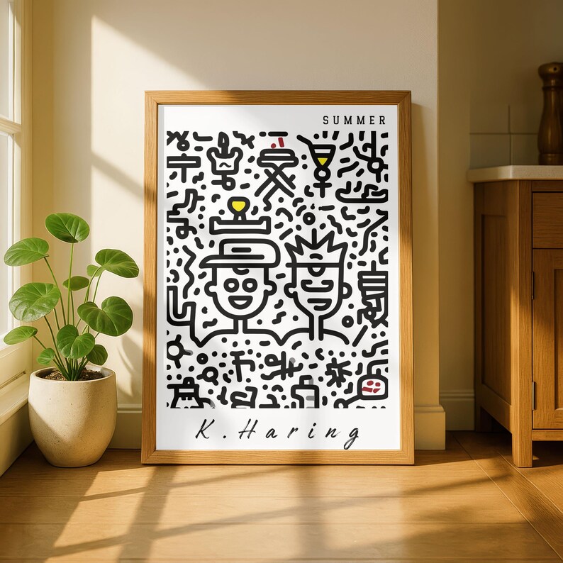 May include: A framed art print featuring a black and white illustration with the word "SUMMER" at the top. The artwork includes two stylized figures and various abstract shapes. The artist's signature, "K. Haring," is at the bottom.