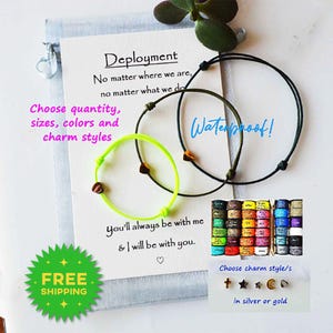 May include: Two adjustable bracelets with a green and black cord, a yellow cord, and a brown charm. The bracelets are displayed on a white card with the text "Deployment" and "Waterproof!" The card also includes the text "Choose quantity, sizes, colors and charm styles".