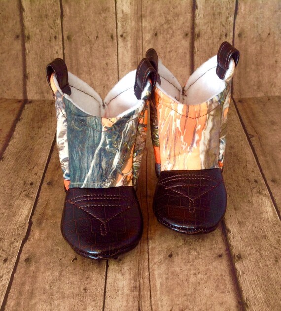 Orange camo top cowboy boots