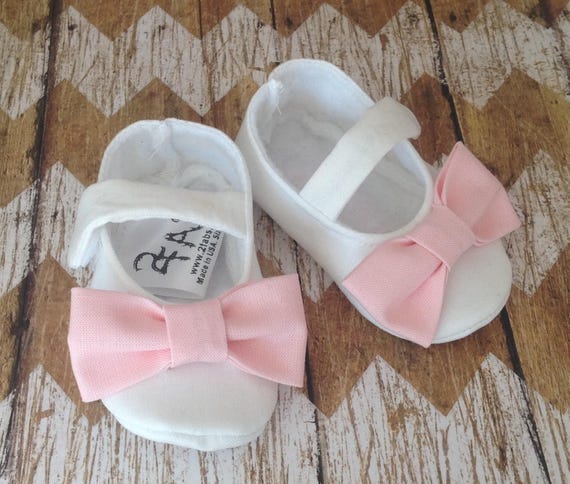 light pink baby shoes