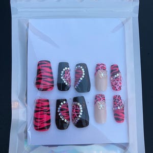 Pink and black y2k nails