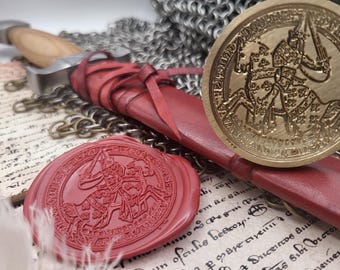 May include: A medieval-themed image featuring a sword with a wooden handle and a red leather sheath. A red wax seal and a gold-colored seal with a knight on horseback are also present, along with chainmail and aged parchment.