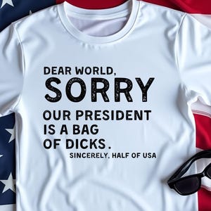Dear World Sorry Our President Is A Bag Of Sincerely, Funny Political Satire Tee, Sarcastic Political Humor, Ironic Statement, Witty Protest
