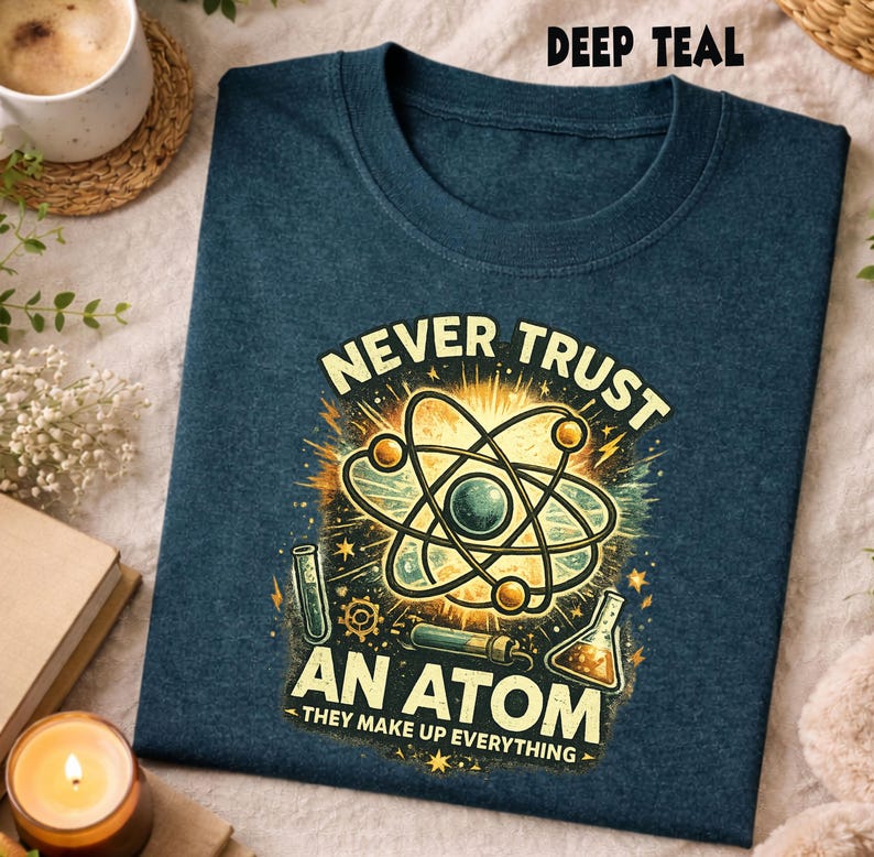 This science themed graphic shirt features a clever and humorous physics joke built around the classic atom concept. The design uses clean typography and a balanced layout to highlight the joke clearly, making it easy to read and instantly recognizable for science lovers. The artwork feels simple yet expressive, focusing on humor that connects with teachers, students, and anyone who enjoys clever science wordplay.

The visual style is intentionally minimal and classroom friendly, avoiding
