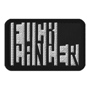 May include: Black rectangular patch with the embroidered text "FUCK CANCER" in white. The patch has a black border and a textured appearance, suitable for sewing onto clothing or accessories.