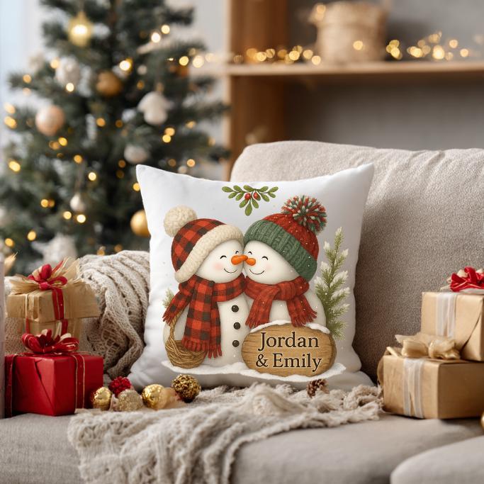 Personalized Christmas pillow with stitched holiday design.