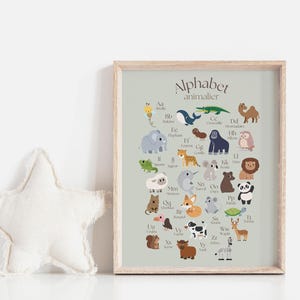 May include: A light green printable poster with the title "Alphabet Animals" and illustrations of animals from A to Z. Each animal is paired with its corresponding letter and a short name for the animal.