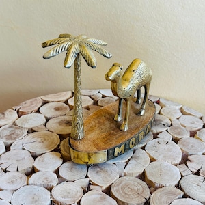 Moroccan Brass Camel & Palm Decor – Handcrafted Camel Figurine on Wood Base – Boho  decor Camel Sculpture for Desert-Themed Shelf Display