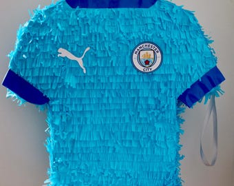 Manchester City inspired piñata including buster and blindfold