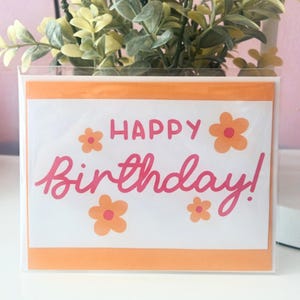 Cartão de feliz aniversário com flores