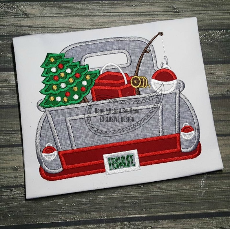 May include: Embroidered design of a gray pickup truck bed filled with a green Christmas tree, red tackle box, fishing rod, and bobber. The text "FISH4LIFE" is on the tailgate. The design is on a white background.