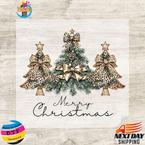 May include: A festive Christmas design featuring three stylized Christmas trees. The central tree is green with gold bows and pinecones, flanked by trees with leopard print bows. The words "Merry Christmas" are written in elegant script.