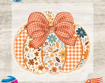 May include: A pumpkin-shaped design with a large orange and white plaid bow. The pumpkin sections feature floral patterns and orange and white plaid. The design includes blue, yellow, and brown flowers. The words "Ready to Press DTF Transfer" are visible.