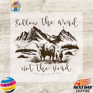 May include: A brown and white graphic featuring a Highland cow and calf in a field, with mountains in the background. The text reads "Follow the word not the Herd" with the Bible verse Isaiah 8:11-13. Includes DTF transfer logos.