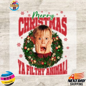 May include: A graphic featuring a surprised child's face surrounded by a Christmas wreath. The words "Merry Christmas Ya Filthy Animal!" are in red and green. The image is a ready-to-press DTF transfer.