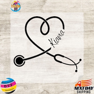 May include: A black stethoscope design in the shape of a heart, with the name "Kiana" in cursive script. The design is a ready-to-press DTF transfer.