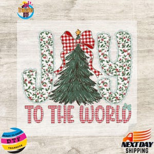 May include: A Christmas-themed graphic with the word "JOY" in a floral pattern, a green Christmas tree, and the phrase "TO THE WORLD" in red plaid. A red plaid bow and a gold star adorn the tree. The design is ready to press.