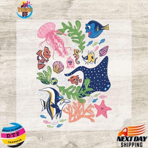 May include: DTF transfer featuring a colorful underwater scene with various sea creatures. Includes a pink jellyfish, orange clownfish, blue tang, and a spotted manta ray. Green seaweed, coral, and other fish are also present. The image has the text "READY TO PRESS DTF TRANSFER".