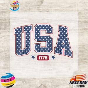 May include: A heat transfer design featuring the word "USA" in bold, patriotic lettering. The letters are filled with white stars on a blue background, outlined in red. The number "1776" is centered below the letters.