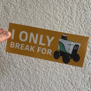 May include: A rustic wooden sign with the text "Welcome to our home" in white lettering. The sign features a distressed finish and a simple, inviting design, perfect for a front porch or entryway.