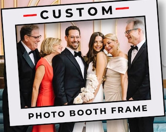 May include: A photo booth frame with the word "CUSTOM" above and "PHOTO BOOTH FRAME" below. The frame surrounds a group of people, including a bride and groom, all dressed in formal attire.