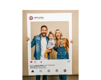 May include: A family of three poses inside a large white Instagram frame. The frame includes a profile picture, username, and text that reads "liked by Person Name and 1,764 others. Your name Strike a Pose! #strikeApose #instaframe."