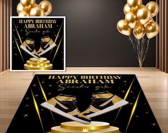 May include: A black and gold sneaker-themed birthday party decoration. The design features a pair of sneakers on a golden pedestal, with the text "Happy Birthday Abraham Sneaker Gala". Gold balloons are in the background.