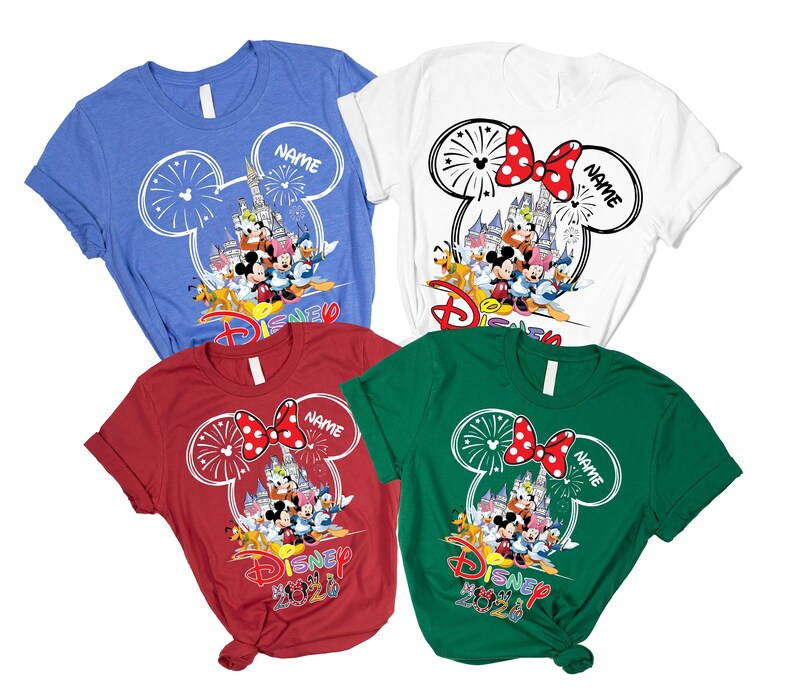 May include: Four short-sleeved t-shirts in blue, white, red, and green. Each shirt features a graphic of a castle, fireworks, and Disney characters inside a Mickey Mouse outline. The text "NAME" and "DISNEY 2020" are printed on the designs.