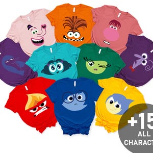 May include: Set of 10 t-shirts featuring characters from the animated film Inside Out. Each shirt features a different character, including Joy, Sadness, Anger, Fear, and Disgust. The shirts are all in different colors and have a simple design.