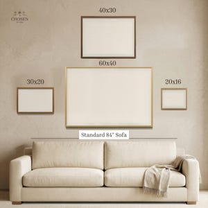 Size guide showing available dimensions for Good Shepherd Christian wall art above a sofa.