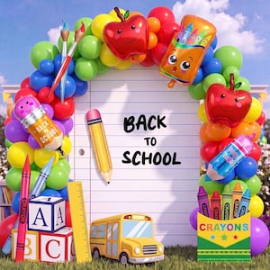 May include: A back-to-school balloon arch featuring a large lined paper backdrop with the text BACK TO SCHOOL. The arch includes foil balloons shaped like apples, a pencil, a crayon box, and paintbrushes, alongside colorful latex balloons.
