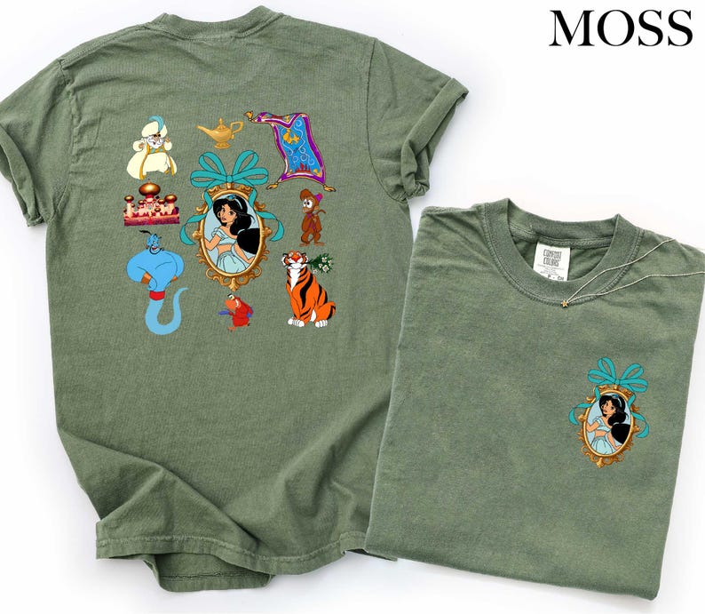 a green t-shirt with various cartoon characters and a small pocket on the front.