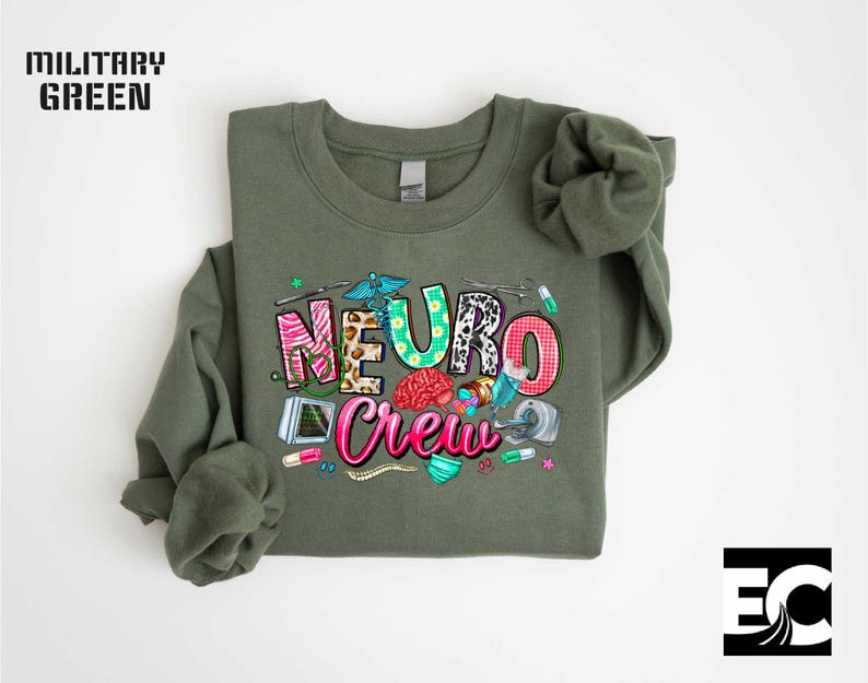a green sweatshirt with a colorful graphic design on it, including the text "NEURO CREW" and various medical and science-related icons.