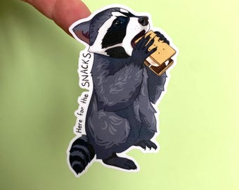 Camping Raccoon Eating a S’more Waterproof Sticker for Waterbottles, Laptops, Notebooks “Here For The Snacks”