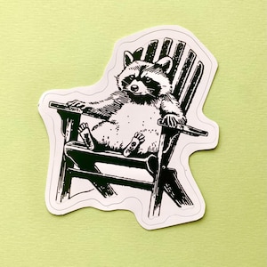 Maskoka Chair Relaxing Raccoon Waterproof Sticker for Waterbottles, Laptops, Notebooks
