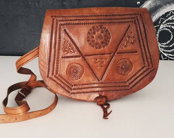 Tooled Saddle Crossbody Bag.