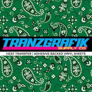 May include: Green paisley bandana pattern with black and white accents.  The pattern is repeated throughout the image.  The text "TRANZGRAFIK SUPPLY CO" is at the bottom of the image.  The text "HEAT TRANSFER | ADHESIVE BACKED VINYL SHEETS" is below the company name.