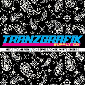 May include: Black background with a white and gray paisley pattern. The image includes the text "TRANZGRAFIK SUPPLY CO" in blue, pink, and yellow, with the words "HEAT TRANSFER | ADHESIVE BACKED VINYL SHEETS" below.