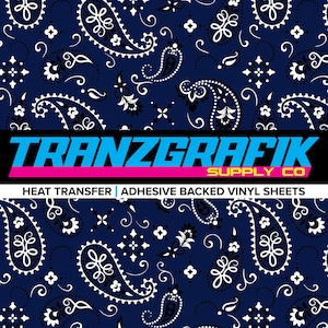 May include: A navy blue paisley pattern with white and black floral designs. The image includes the text "TRANZGRAFIK SUPPLY CO" in blue and yellow, with a pink stripe, and the text "HEAT TRANSFER | ADHESIVE BACKED VINYL SHEETS".