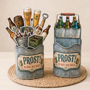 May include: Two galvanized metal beer caddies with a rustic design. One caddy is filled with beer bottles, glasses, and a bottle opener. The other caddy holds six beer bottles. Both caddies have the text "PROST! DU BIST DER BESTE".