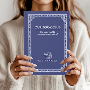 May include: A blue book with white decorative borders and text that reads "OUR BOOK CLUB". The text below says "Stories we read & conversations we shared" and "NAME OF BOOK CLUB". A stack of books is also shown.