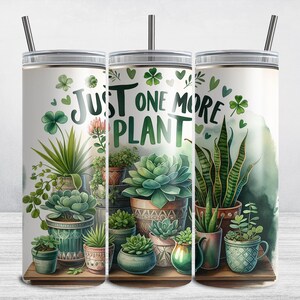 May include: Three stainless steel tumblers with a white background and green plant illustrations. The tumblers have the text "Just One More Plant" printed on them.