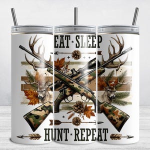 May include: White tumbler with a camouflage design featuring crossed rifles, deer, and the text "Eat Sleep Hunt Repeat".