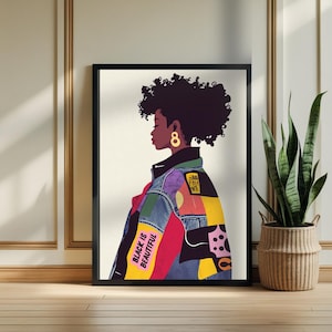 May include: A colorful illustration of a woman with an afro wearing a denim jacket with patches and the text "Black is Beautiful".