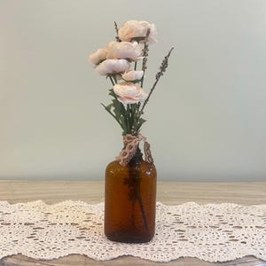 Floral Arrangement Brown glass whiskey bottle flowers embossed rose lace Vintage antique  Country Cottage Farmhouse Decor