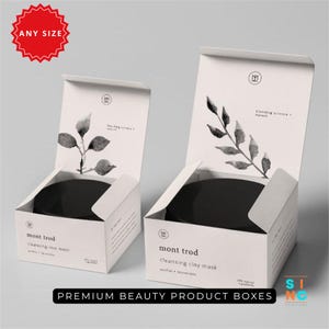 Puede incluir: Dos cajas de productos blancas con tapas abiertas, cada una con un tarro negro. Las cajas presentan un dise&ntilde;o minimalista con una ilustraci&oacute;n bot&aacute;nica y el texto "mont trod cleansing clay mask". Las cajas est&aacute;n etiquetadas como "Premium Beauty Product Boxes".